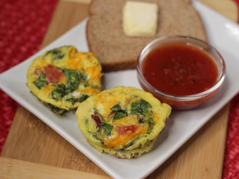 rise and shine muffins on a plate with side of toast and salsa