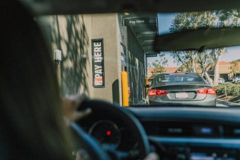 Cars in a fast-food drive through