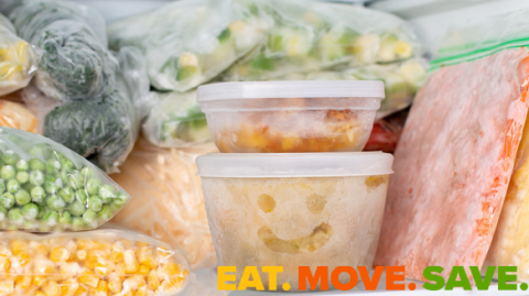 bags and containers of frozen foods in a freezer.