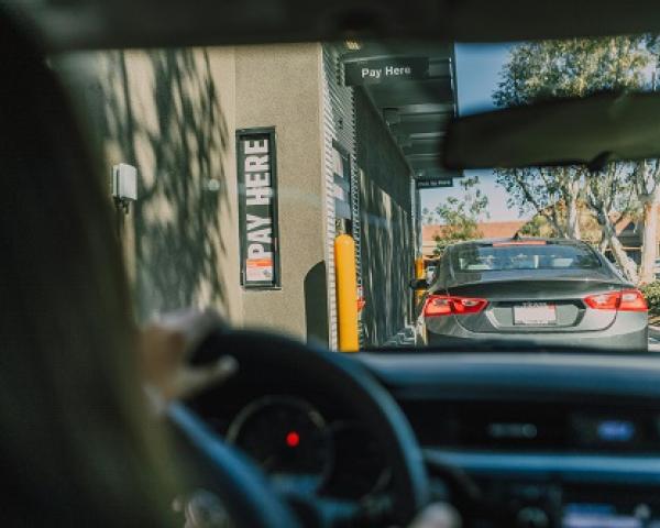 Cars in a fast-food drive through