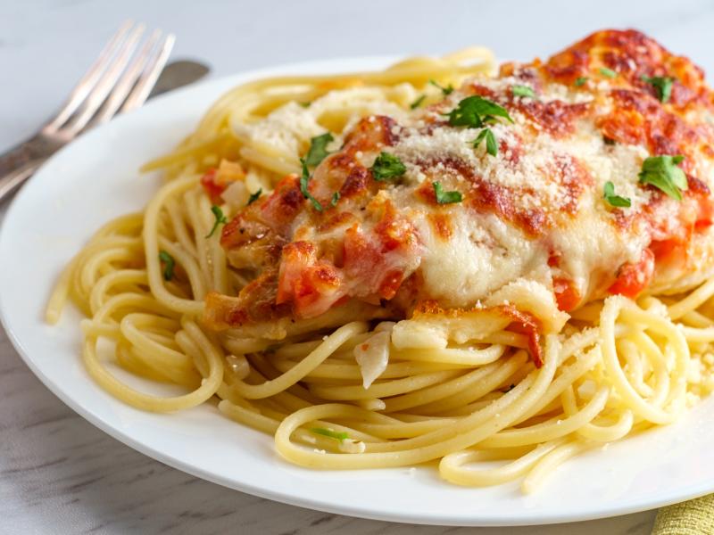 chicken parmesan over spaghetti