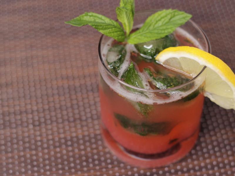 Strawberry sipper drink with mint ice cubes