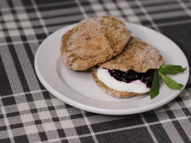 Whole wheat yogurt rolls with cream and jam.