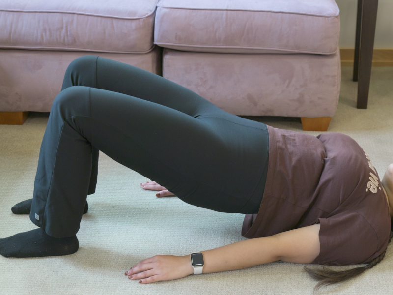 woman practicing bridge pose