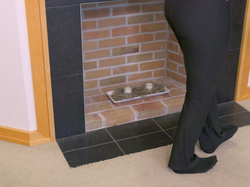 heel walk with wall assistance