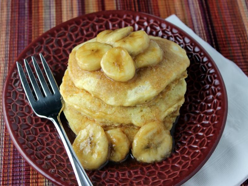 Oatmeal Pancakes topped with bananas