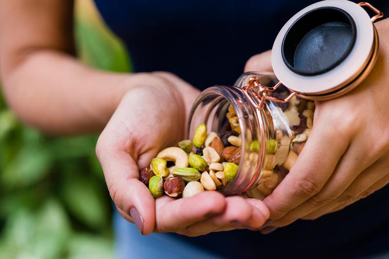 woman eating nuts