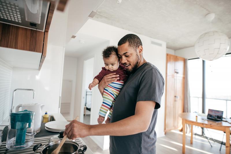 dad and baby cooking together